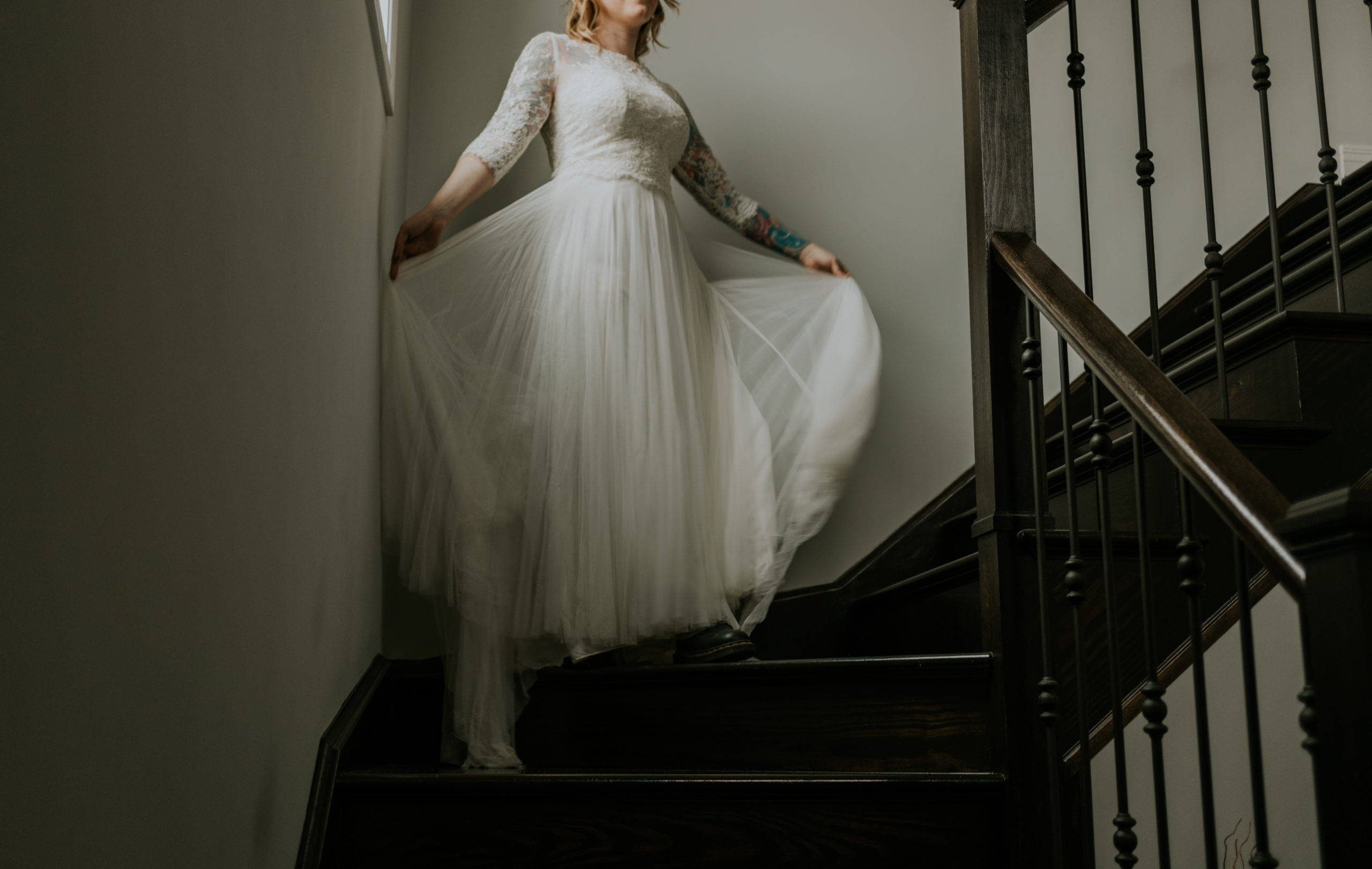 Bride Eva gets ready and twirls dress at the Wedding Legends Workshop during an elopement with Cara Gilhula Photography
